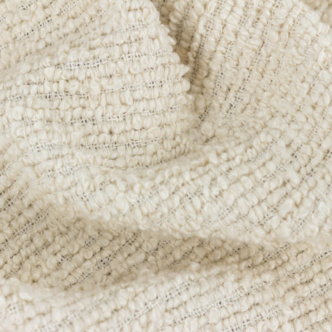 The Candar Textured Boucle Throw Cream